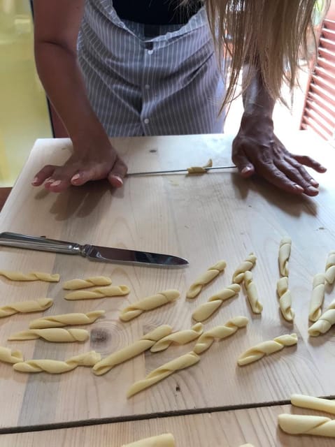 Lecce Home Cooking Class: Craft Orecchiette & Savor Wine - Sitting down to a three-course home dinner
