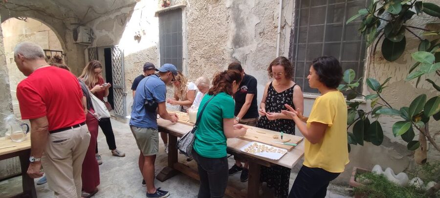 Lecce: Pasta Making Class in 1400s-Era Courtyard with Wine - Making pasta inside Lecce’s old courtyard