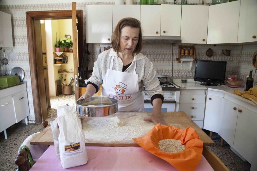 Lecce: Pasta & Tiramisu Cooking Class at a Local's Home - Sitting down to eat what you made