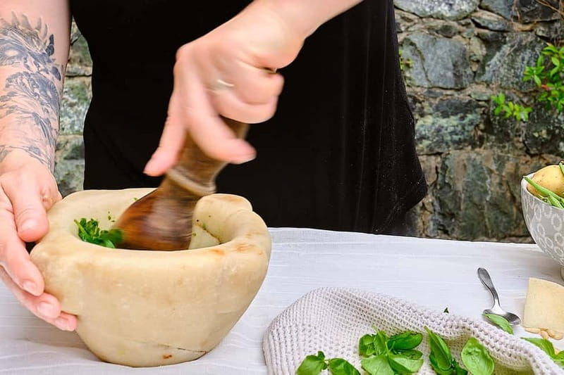 Levanto, Cinque terre: Fresh Pasta and Pesto cooking class - Grinding pesto in the traditional mortar