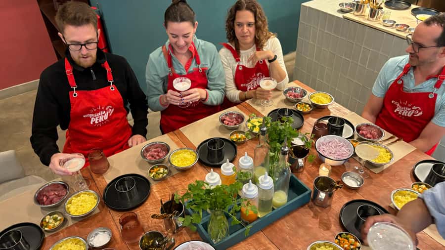 Lima: Market Tour and Cooking Class with Pisco Sour - Reading Surquillo Market through its produce