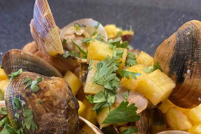 Lisbon Market and Food Tour with Cooking Class and Lunch - Choosing fish, shellfish, and produce with the chef