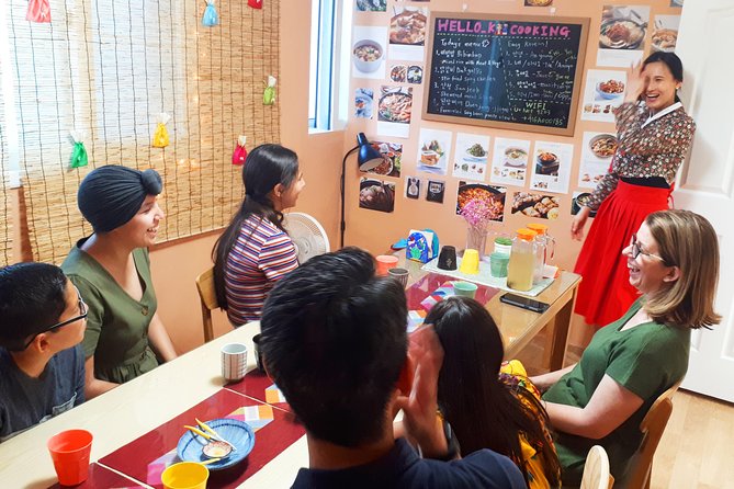 Local Home Korean Cooking Class & Market Adventure in Seoul - Preparing four Korean dishes by hand