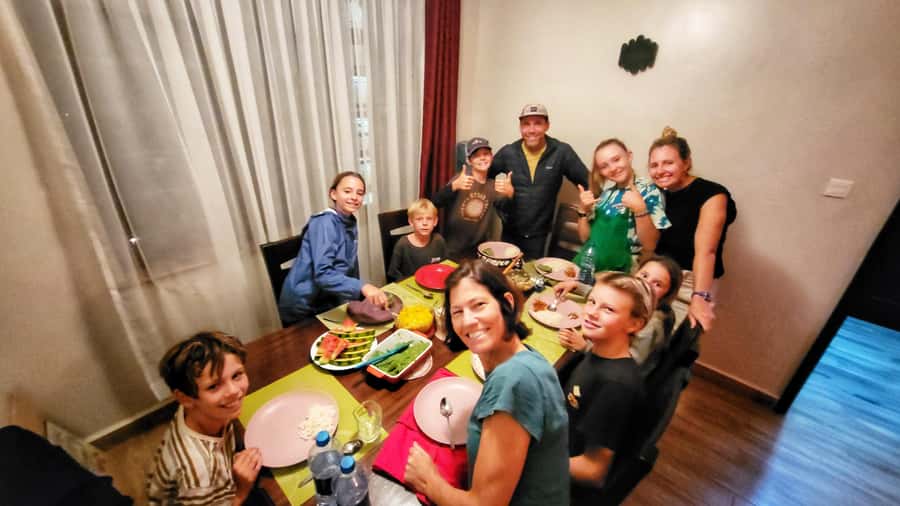 Local Market Tour and Traditional Meal Cooking Class - Eating the meal in a private home