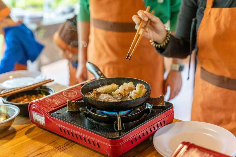 Mad Monkey Hoi An Cooking Class & Bamboo Boats - Riding bamboo boats through Cam Thanh
