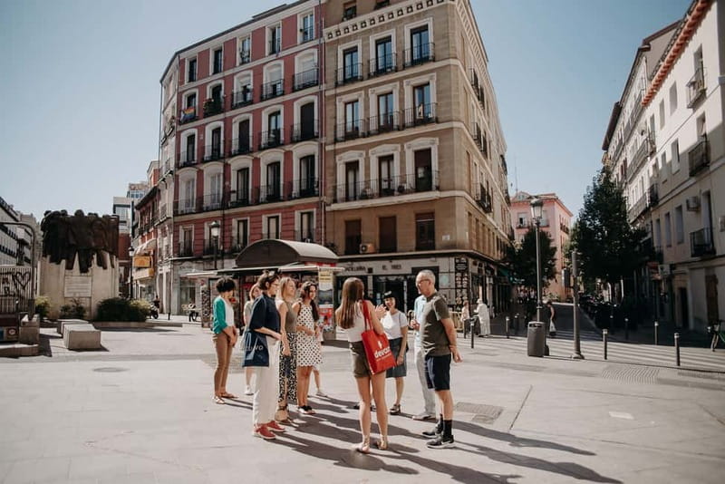 Madrid: Paella & Tapas Cooking Class and Market Visit - Sitting down to eat your own cooking