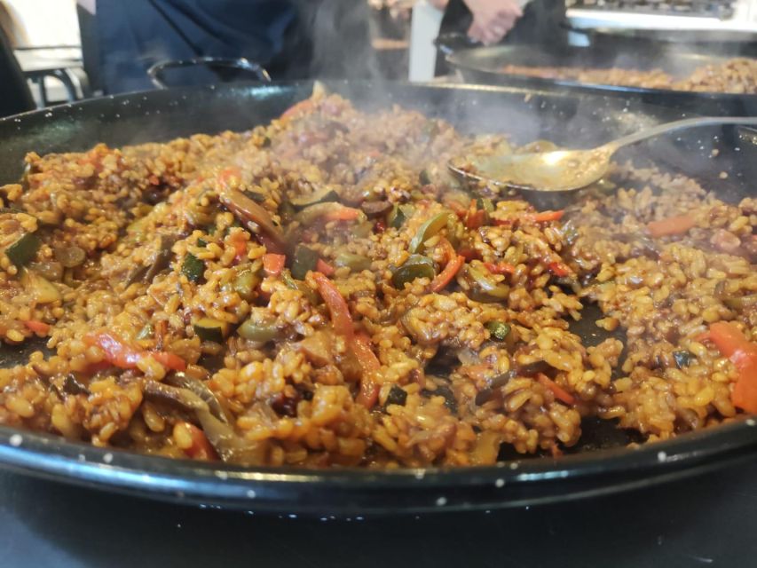 Malaga: Authentic Paella Cooking Class with Sangría - Cooking paella with Alba, Alma, Pepe, and other local chefs