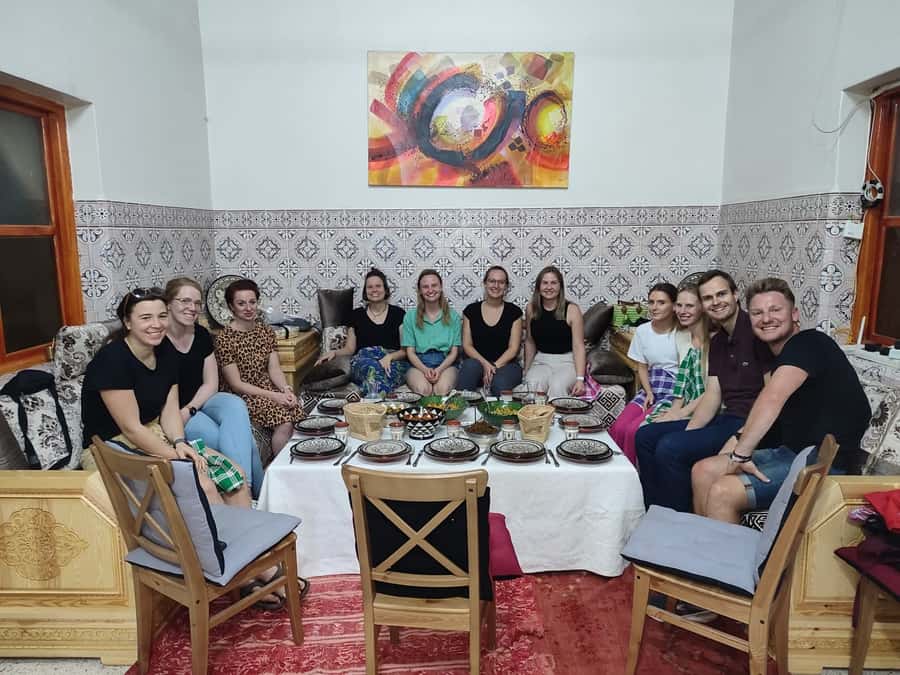 Marrakech: Cooking class in Marrakech by Chef Ayoub - Sitting down to a shared Moroccan meal