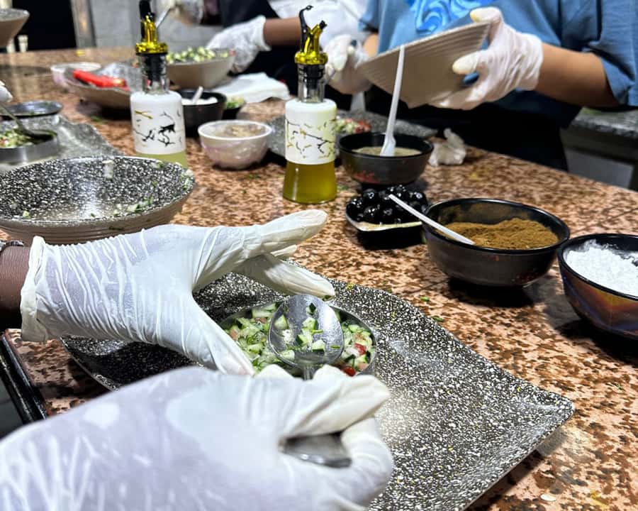 Marrakech: Moroccan Cooking Class with Pickup - Sitting down to eat what you made