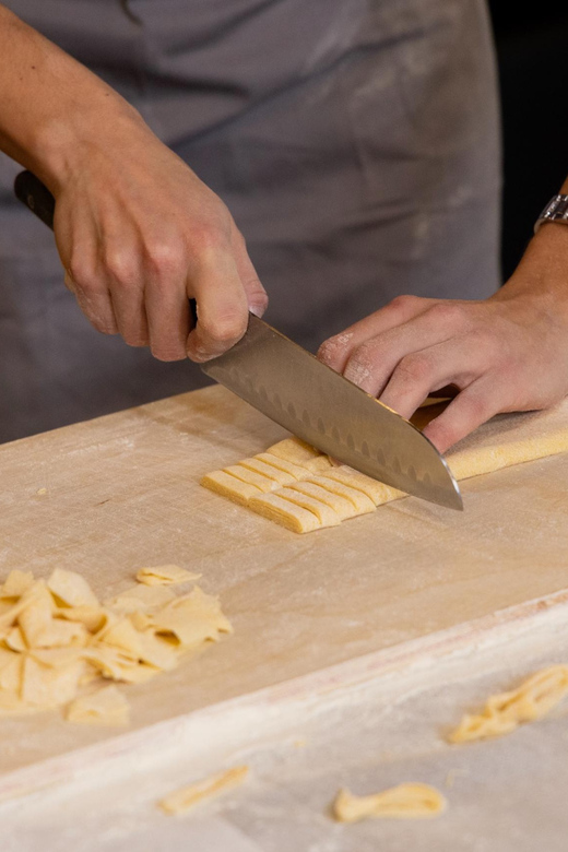 Masterclass: Aperol Spritz & Pasta Making Experience in Rome - Making a Spritz near Piazza Navona