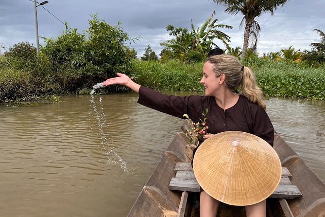 Mekong Day Trip Explore Village Bicycle CookingClass Group 12 Pax - A gentle boat ride on the Tien River
