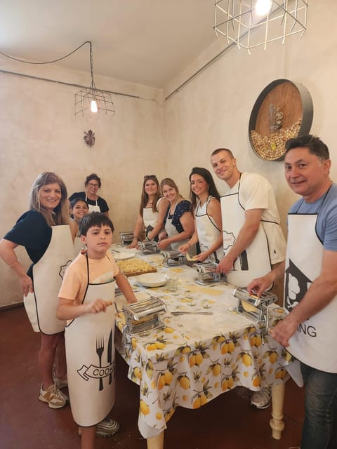 Milan: Pasta and Tiramisu Cooking Class with Wine - Making fresh pasta at your own workstation