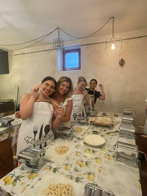 Milan: Pasta and Tiramisu Cooking Class with Wine - From workbench to shared Italian meal