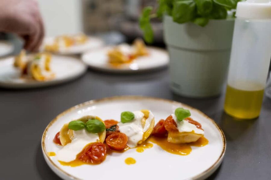 Milan: Pasta, Gnocchi and Tiramisù Cooking Class with Wine - Wine, conversation, and the shared meal
