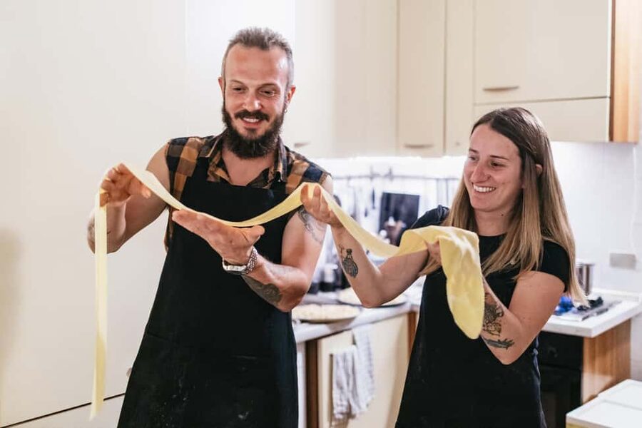 Milan: Pasta & Tiramisu Cooking Class with Premium Products - Kneading egg pasta and learning the feel of dough