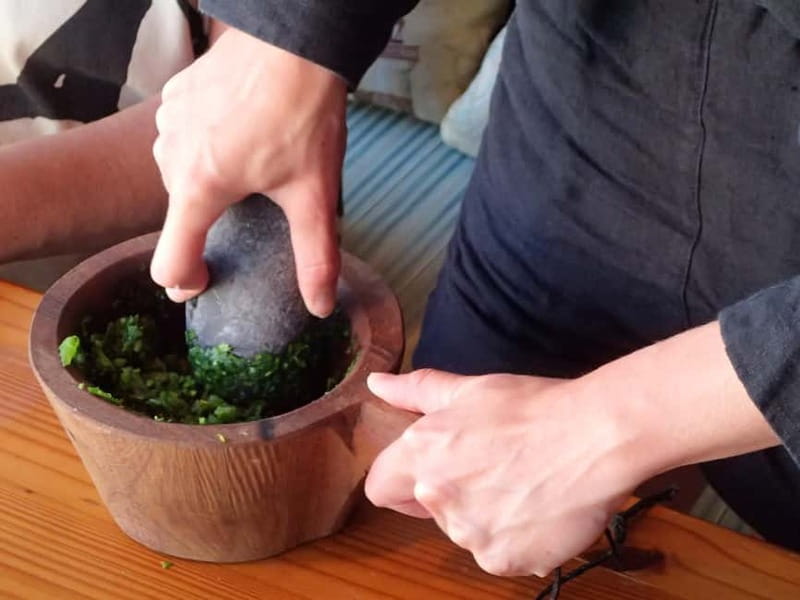 Mojo Workshop Cooking Class in Ancient Canarian Village - Grinding red and green mojo by hand
