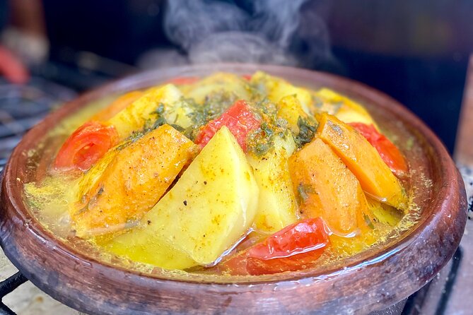Moroccan Cooking Class with a Local Family & Market Visit - Preparing couscous, tagine, and zaalouk