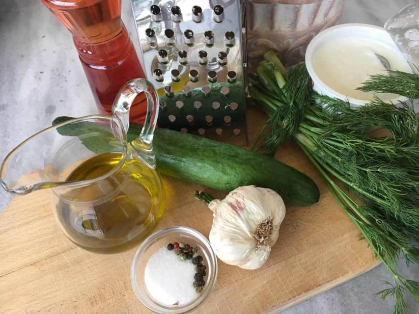 Mykonos: Cooking Class with Food and Wine - Sitting down to eat what you prepared