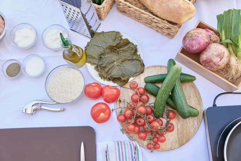 Mykonos: Hands-On Cooking Class with a Professional Chef - Folding cheese pies, spinach pies, and dolmades