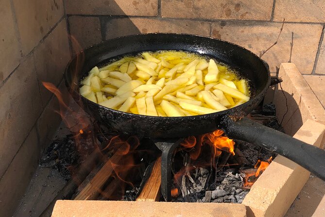 Naxos Perivoli Farm Experience & Wood-fire Cooking Class - Walking, weather, and outdoor comfort