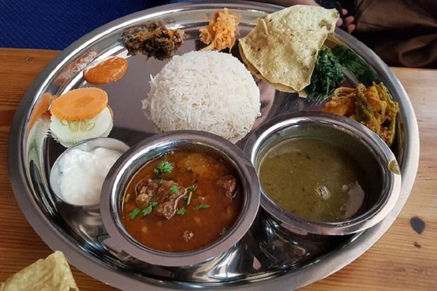 Nepalese Kitchen in Pokhara: Momos or Dal Bhat Cooking Class - Eating what you made
