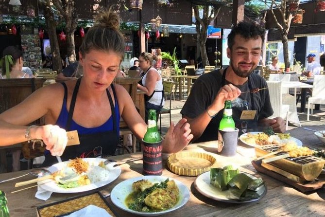 Nia Bali Seminyak Cooking Class - Choosing ingredients at a traditional market
