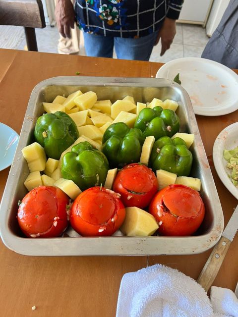 Oia: Greek Cooking Class and Lunch with a Local Grandmother - Meeting Areti outside Karma Restaurant