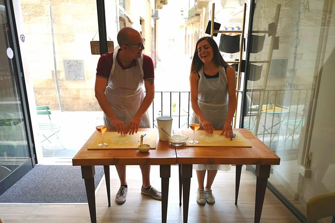 Orecchiette Cooking Class and Wine Pairing in Lecce - Wine and Puglian food at the table