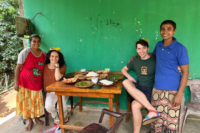 Organic cooking class sigiriya (kumara & family) - Cooking several curries over wood fires