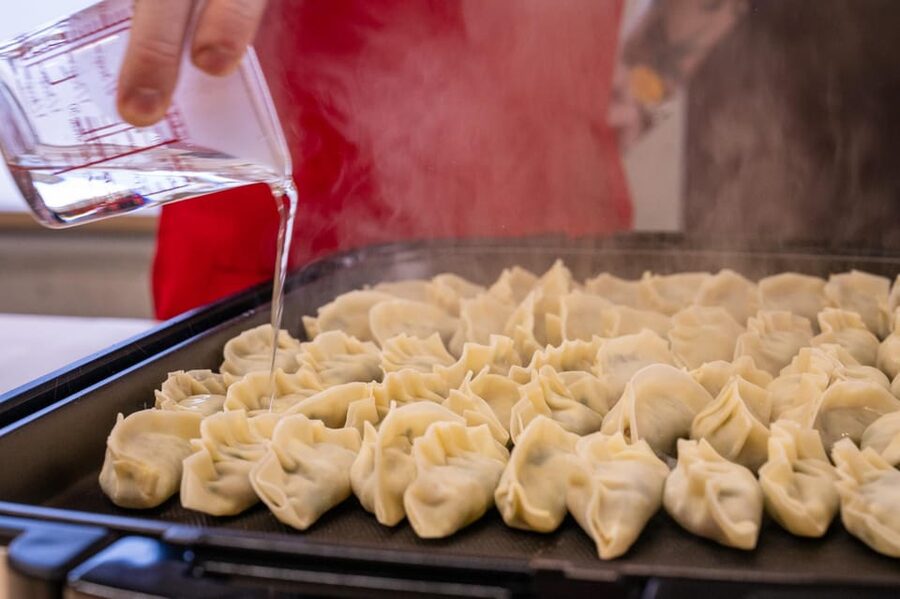 Osaka: Cooking Class & Sake Tasting with Local Market Visit - Cooking niku-sui, Osaka’s comforting beef soup