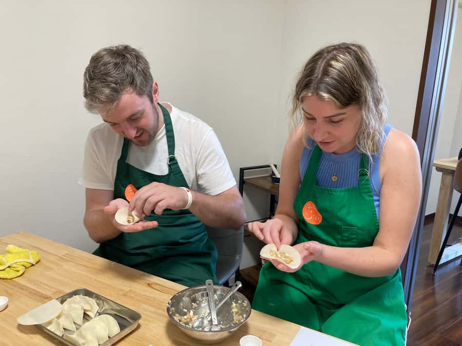 Osaka: Ramen and Gyoza Cooking Class in Dotonbori - Building the broth: chicken bones, dried sardines, and soy sauce