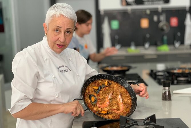 Paella Cooking Class in Malaga - Building the paella from sofrito to final pan