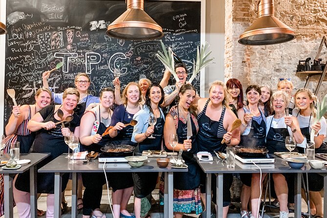Paella Cooking Class with Professional Chef: Four Course Dinner - Four courses, wine, and a lively dining room