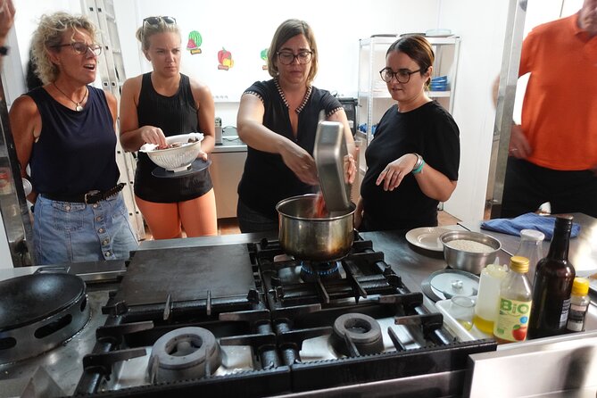 Paella & Sangria Class with Tapas and Market Visit - Preparing tapas, tomato salad, and sangria