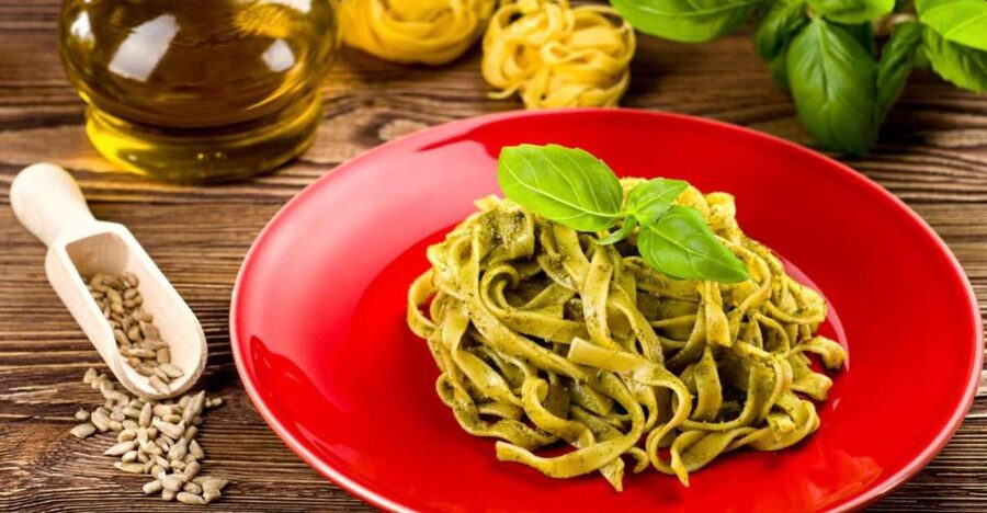Pasta Cooking Class with Pesto Sauce Making in Rome Center - Making pasta in the middle of Piazza Navona