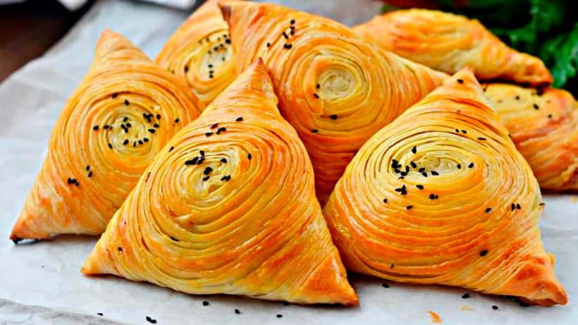 Plov and Samsa Cooking Class in Tashkent - Cutting onions, carrots, meat, and rice