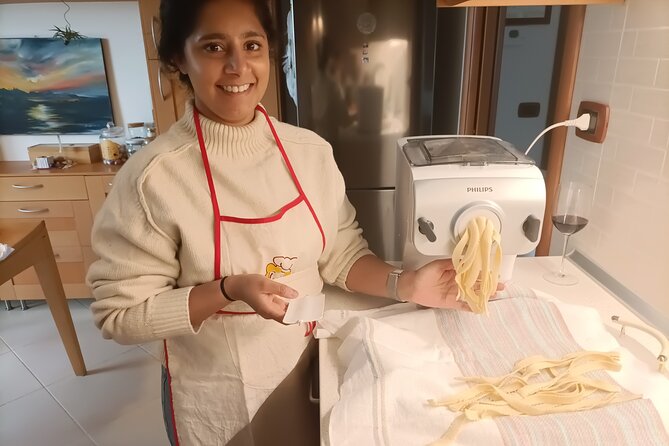 Premium Cooking Class in Bari: Pasta & Tiramisu, free wine bottle - Sharing local wine and the finished meal