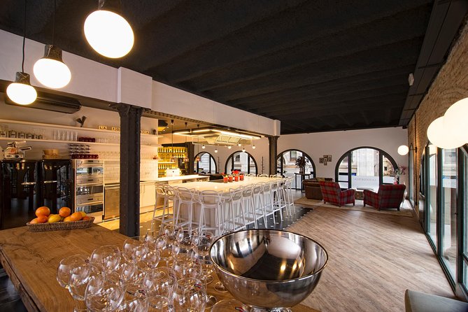 Premium Cooking Class in Designer Loft: Paella & Spanish Tapas - Cooking paella in a Barcelona loft