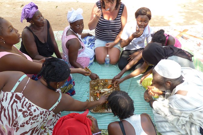 Private Full-Day Gambian Home Cooking Experience in Banjul - Entering a Gambian family compound