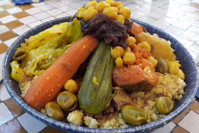 Private Moroccan Cooking Class in Casablanca with Hotel Transfers - Preparing tagine with Fouzia