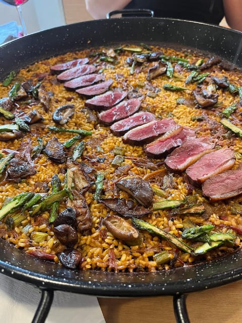Private Paella & Tapas Cooking Class in a Local Chef's Home - A welcome drink sets the tone