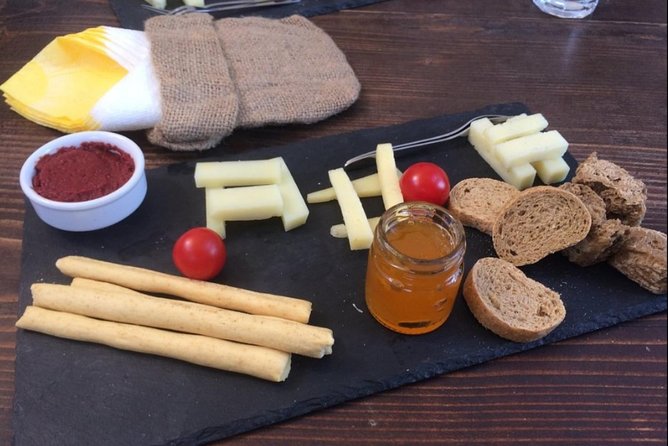 Private Santorini Cooking Class & Wine Tasting Tour - Who should book this Santorini wine tour?