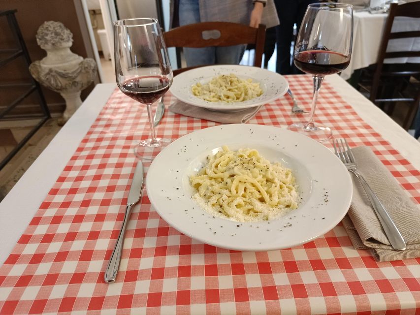 Rome Cooking Class: Handmade Tonnarelli Pasta & Tiramisu - Sitting down for the meal and wine