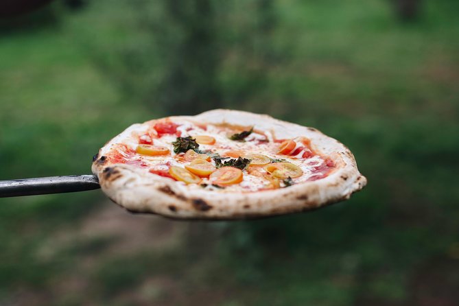 Rome Cooking Class: Make Pizza and Pasta with Wine & Dessert - Making pizza in the wood-fired oven
