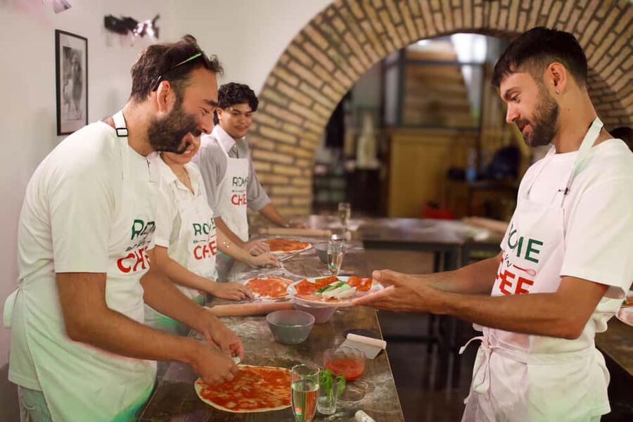 Rome: Hands-On Pizza Cooking Class with Spritz Mixology - The shared table is part of the experience