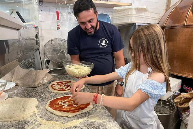 Rome: Neapolitan Pizza Cooking Class in Front of the Vatican - Adding tomato, mozzarella, and fresh ingredients