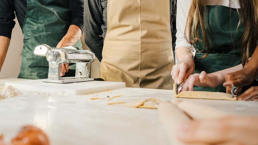 Rome: Pasta and Tiramisu Cooking Class with Prosecco - Rolling fresh fettuccine by hand