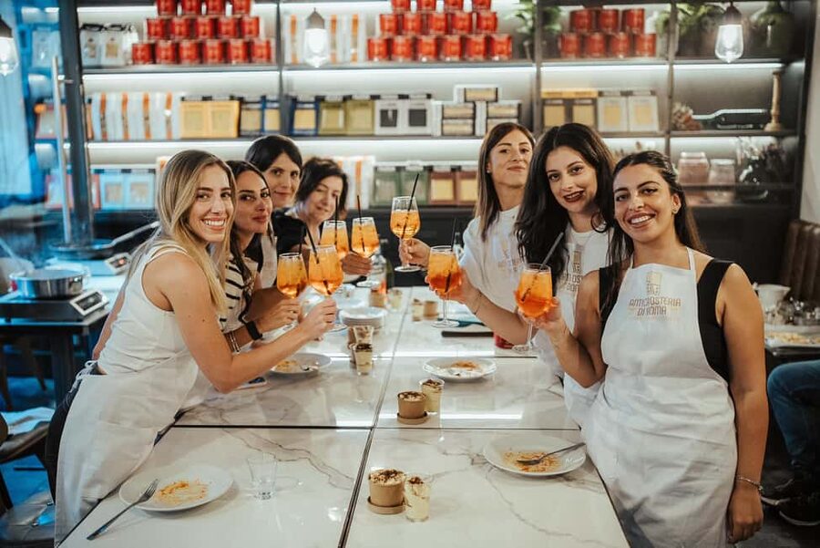 Rome: Pasta and Tiramisu Cooking Class with Spritz and Wine - Sitting down to eat your own work