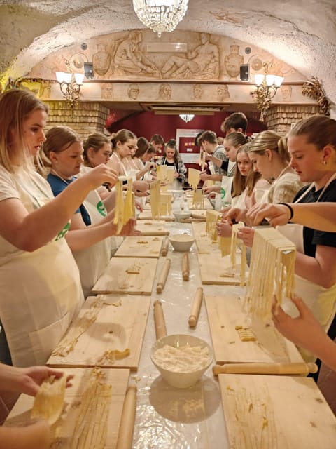 Rome: Pasta & Tiramisu Cooking Class near the Spanish Steps - Mixing egg and flour into fettuccine