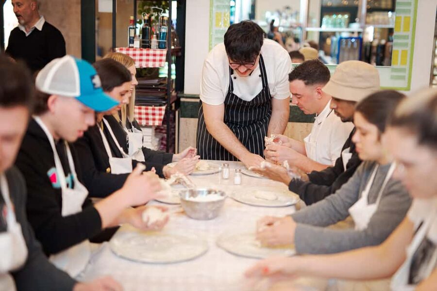 Rome: Pizza Cooking Class in Piazza Navona with Drinks - What the instructors add to the class